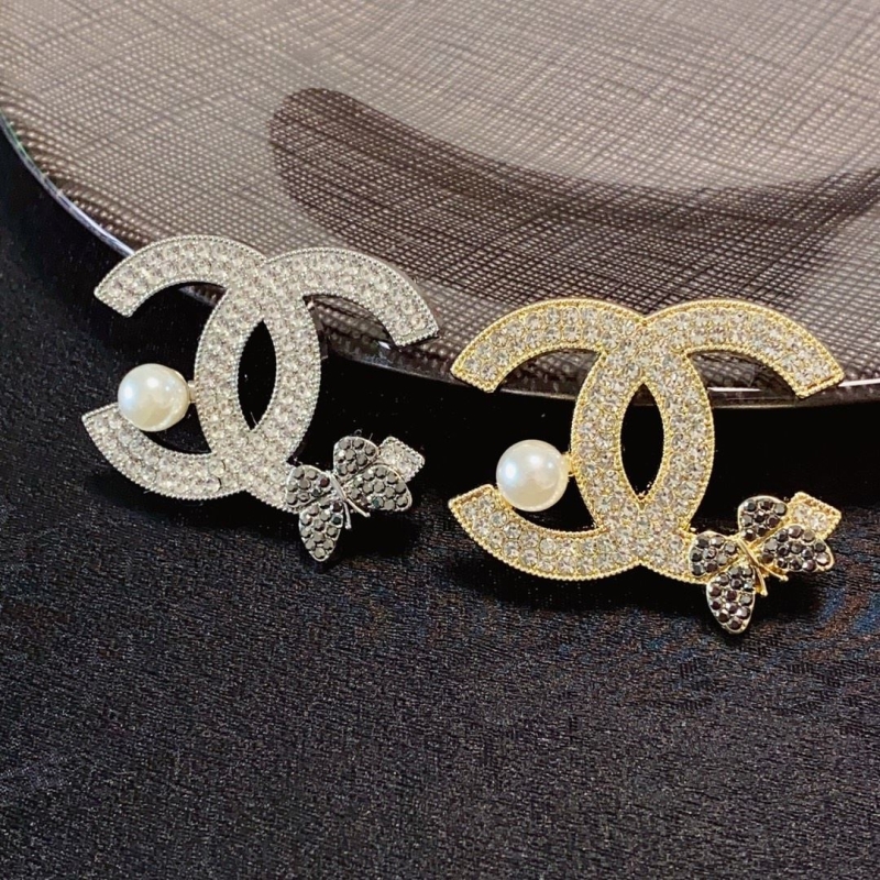 Ch**el brooches